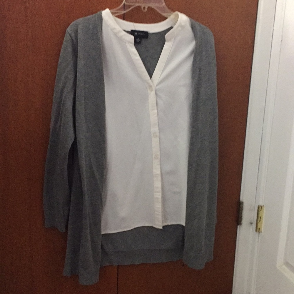 A business blouse with grey sweater attached